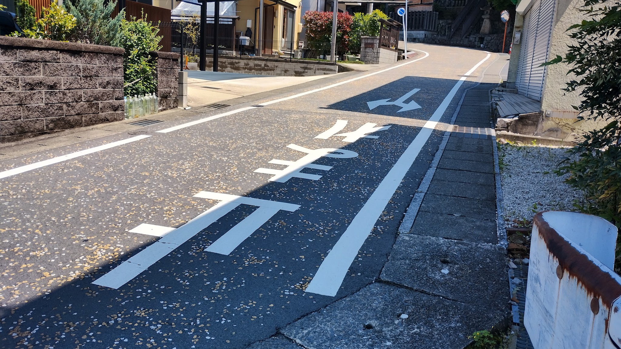 Chayazaka slope with “Stop” written on the road